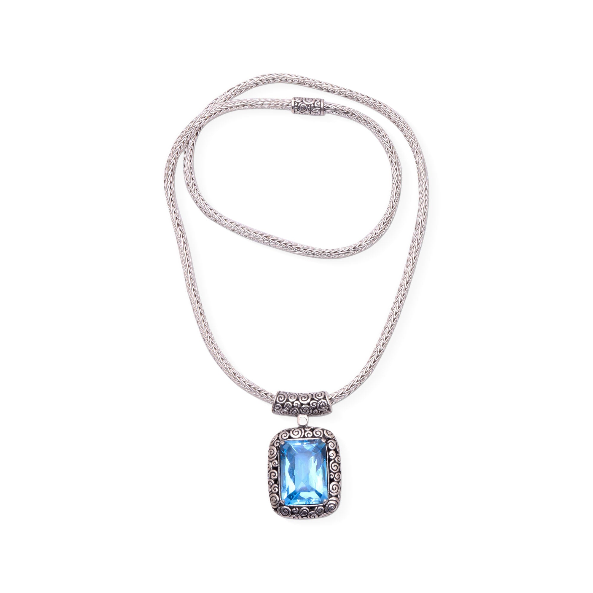 Buddha Curl Memories - a Blue Topaz and Sterling Silver Pendant Necklace from Bali