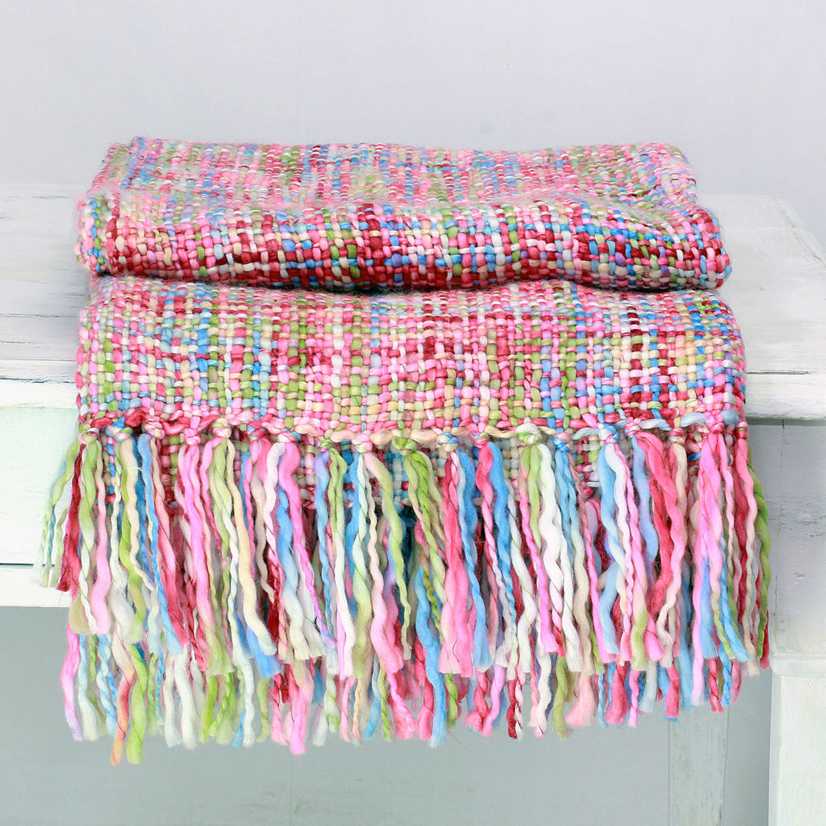 A Handmade Multicolored Throw Blanket with Fringe