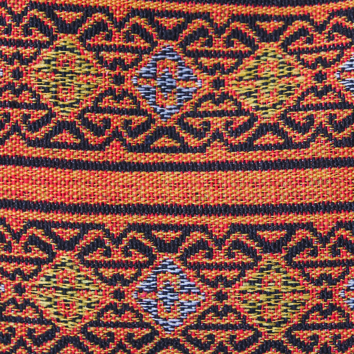 The details in the craftsmanship of the Geometric Cotton Shoulder Bag in Caramel from Thailand