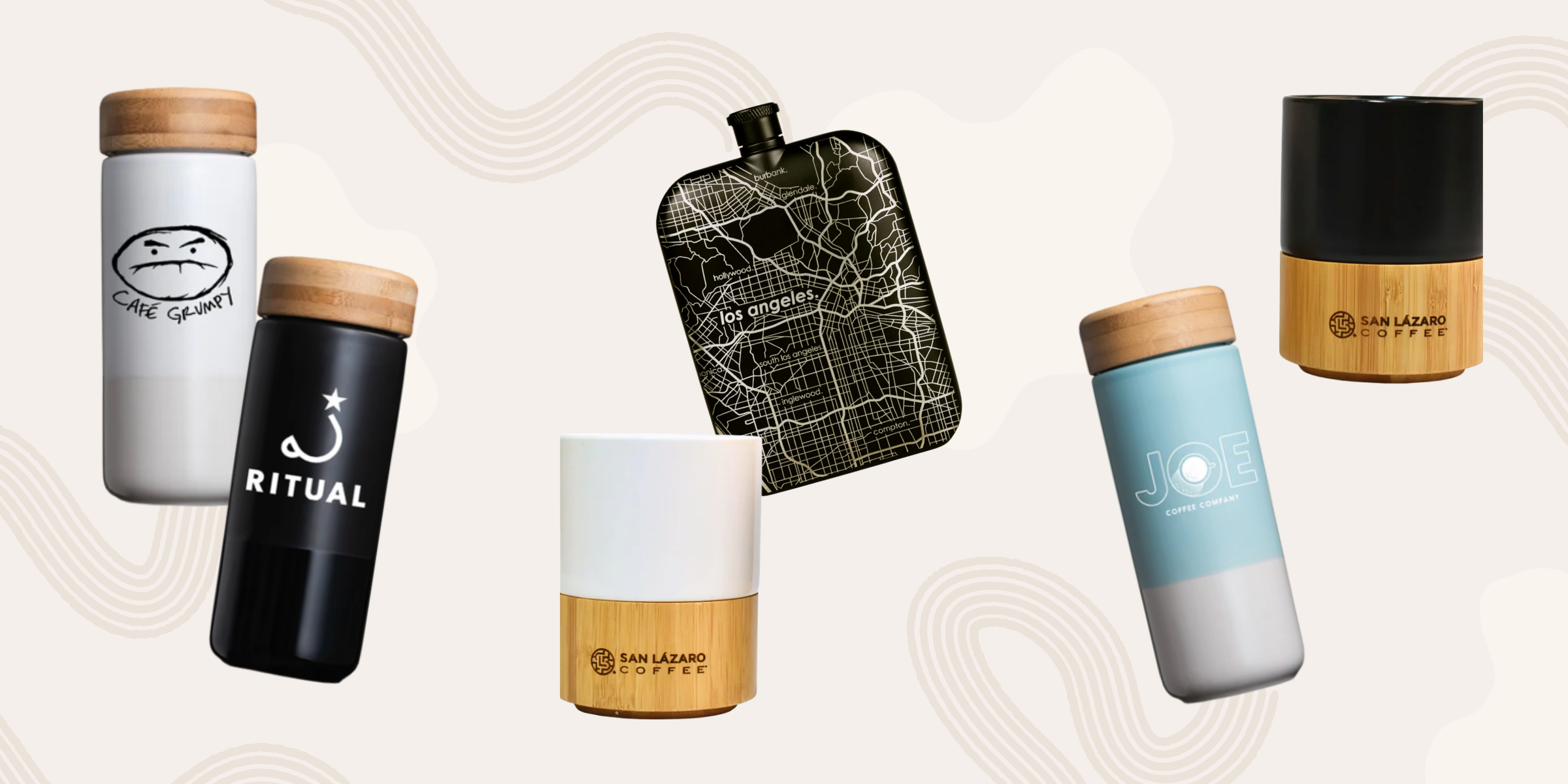 Various insulated mugs and a pot holder on a light background.
