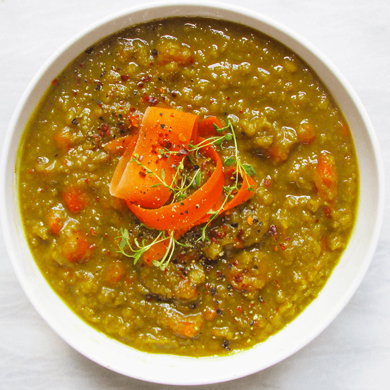 Split pea soup cooked and presented in bowl