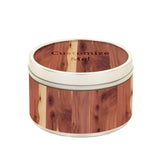 Cedar candle displaying customizable lid