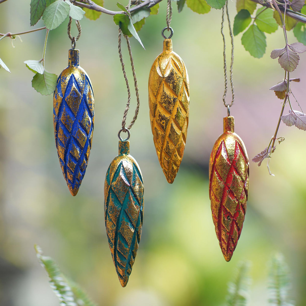 Golden Cones - Four Handcrafted Gold Tone Albesia Wood Ornaments from Bali
