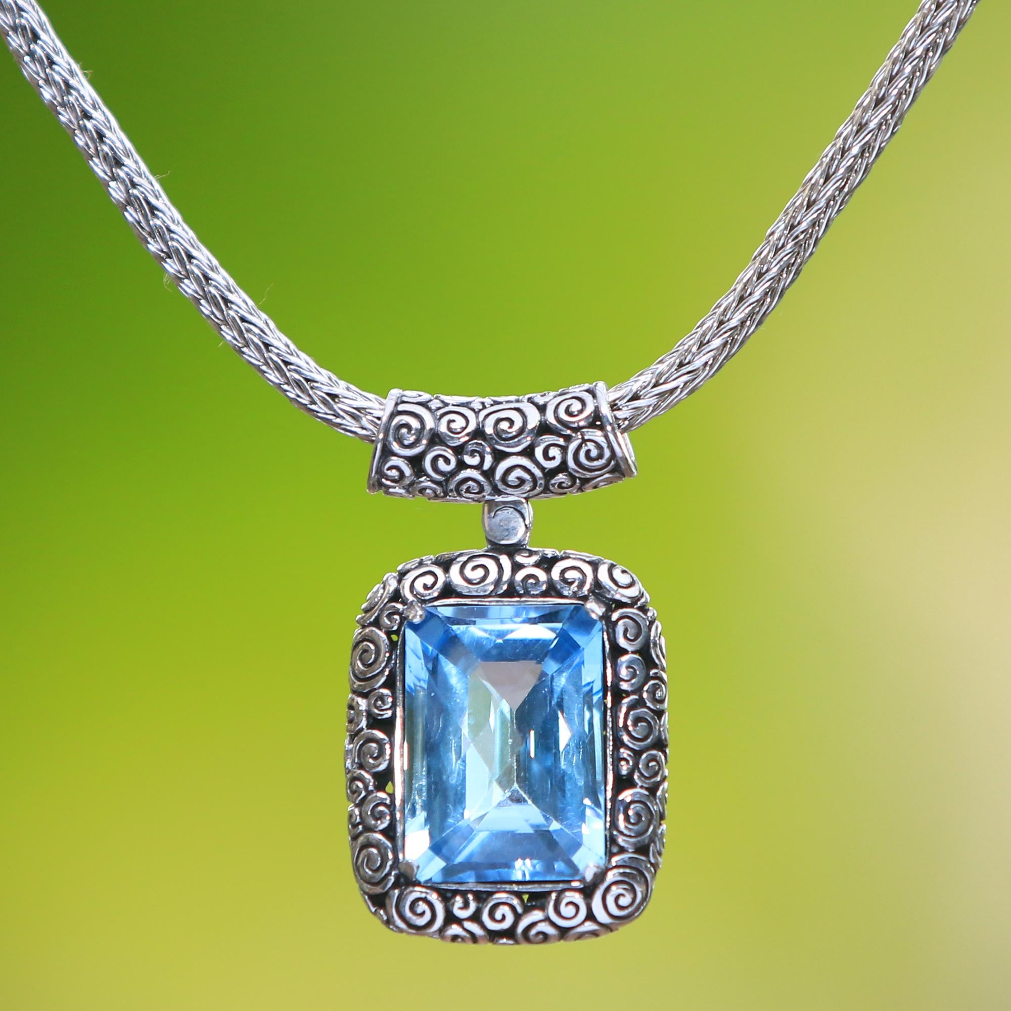Buddha Curl Memories - a Blue Topaz and Sterling Silver Pendant Necklace from Bali