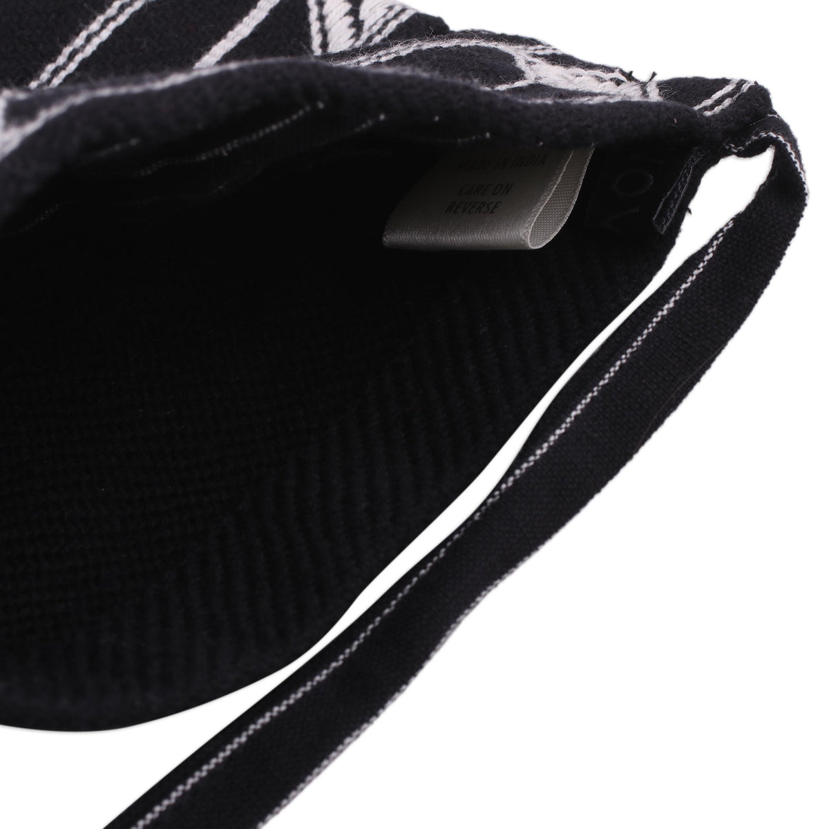 Rajasthani Roads - a Hand Woven Black and White Cotton Sling Bag