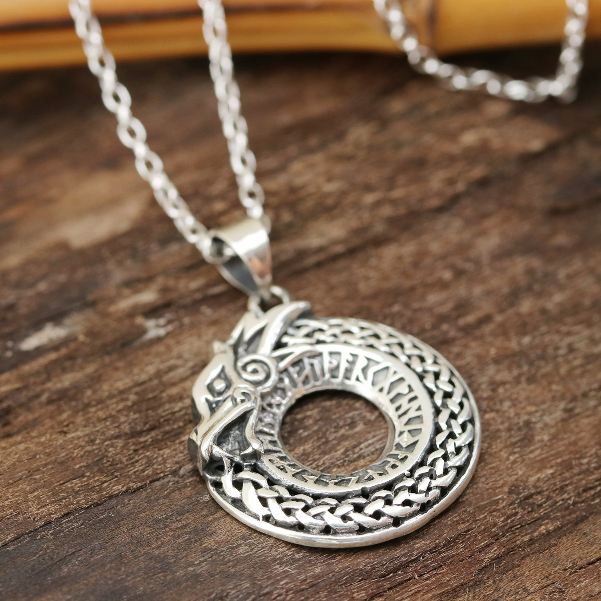 Dragon Ouroboros - a Circular Sterling Silver Dragon Necklace from India