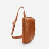Brown leather sling bag with adjustable leather strap