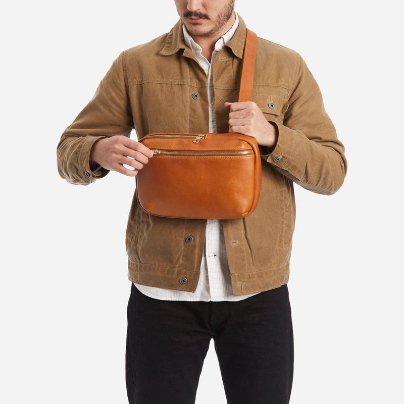 Gender-neutral leather sling bag