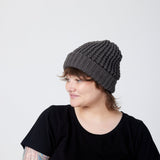 Charcoal beanie on model (side)