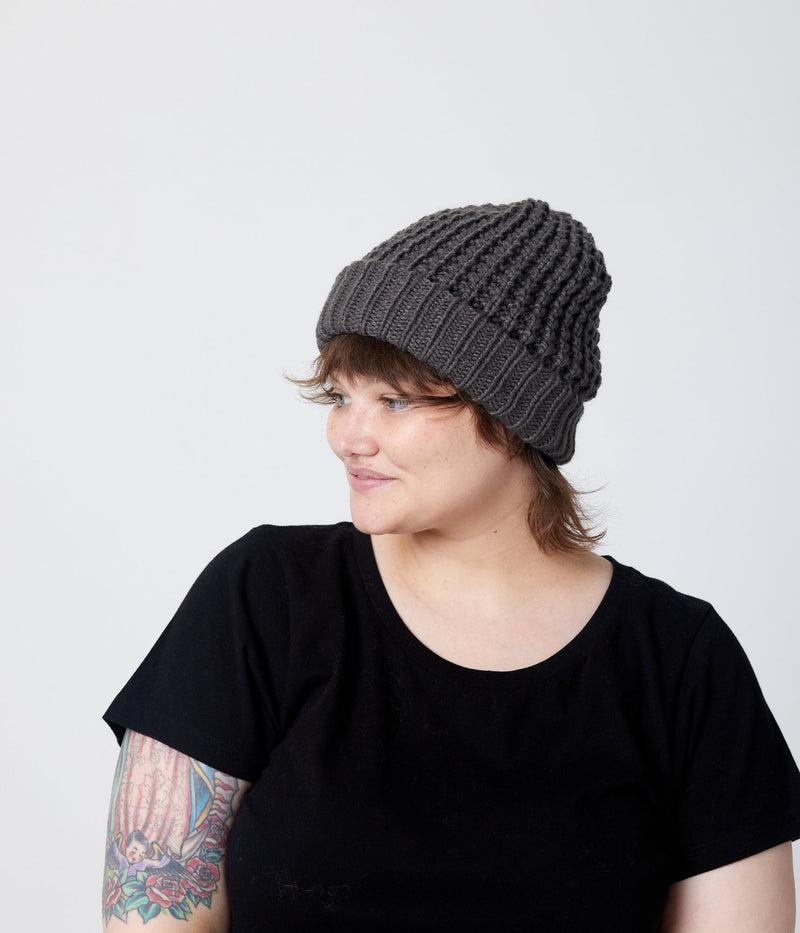 Charcoal beanie on model (side)