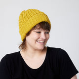 Dijon beanie on model (side)