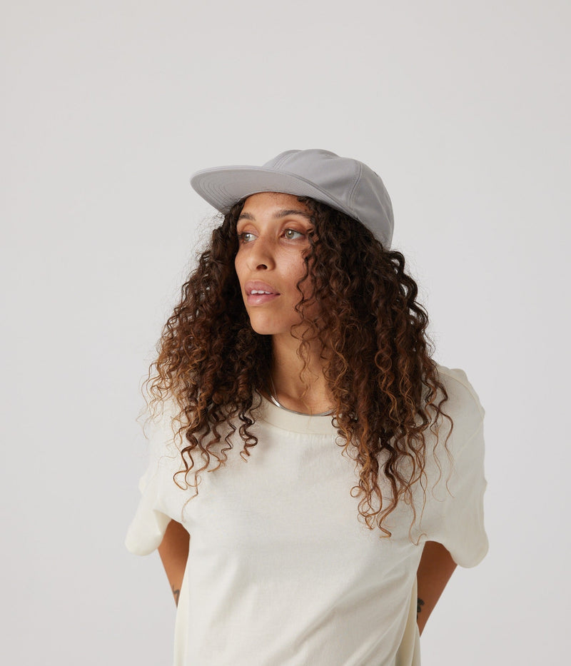 Light grey hat on model