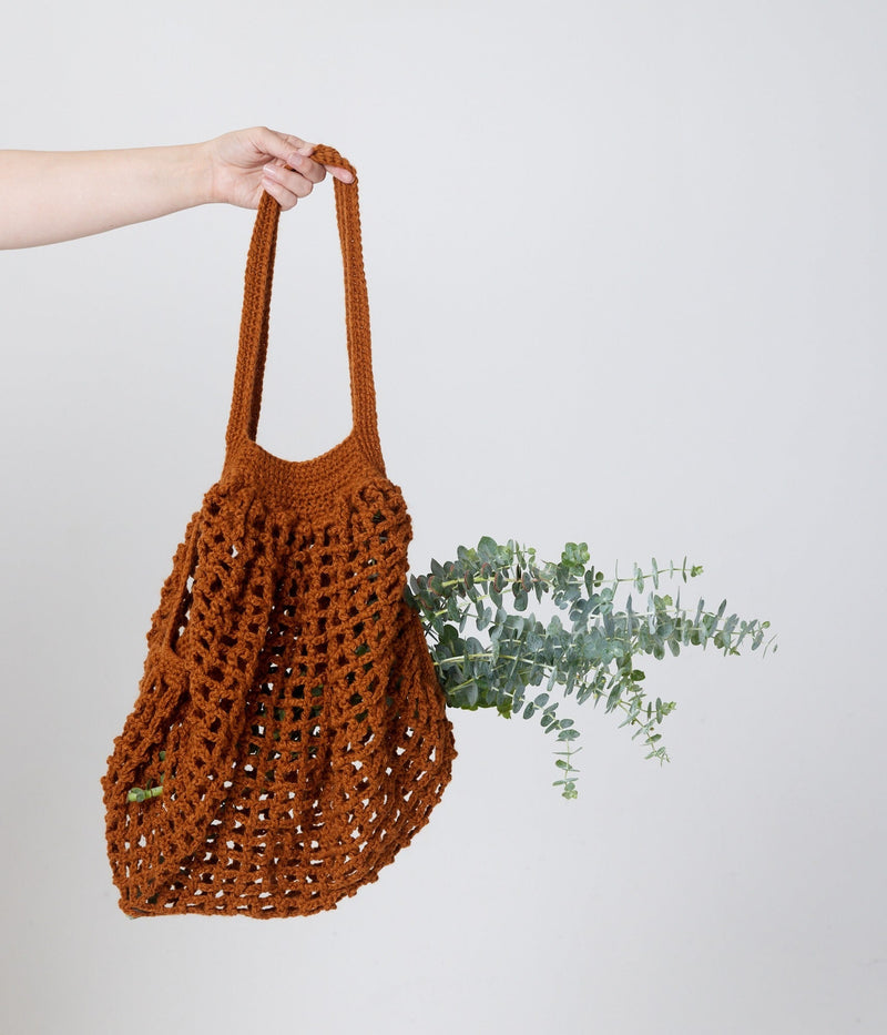 Camel bag with plants inside