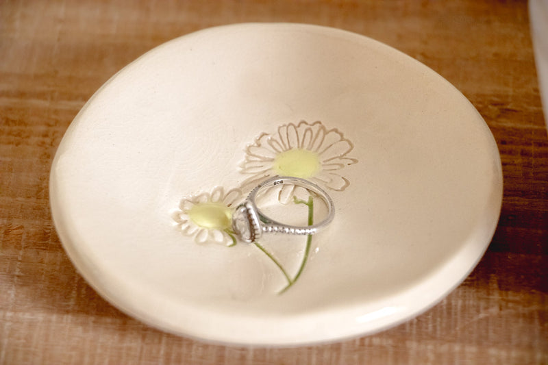 Ring dish with ring inside