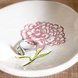 Ring dish with ring inside