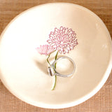 Ring dish with ring inside