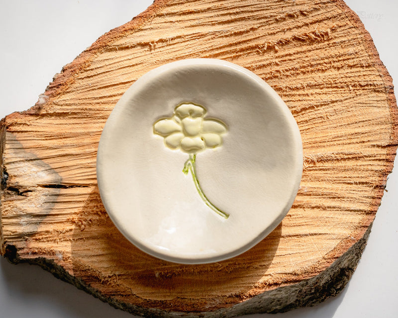 Ring dish on wooden log platter