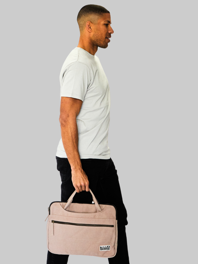 Male model carrying sustainable organic cotton laptop case