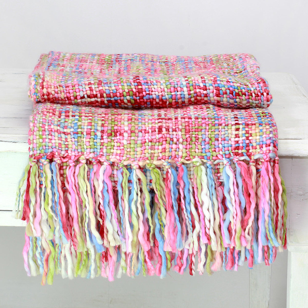 A Handmade Multicolored Throw Blanket with Fringe