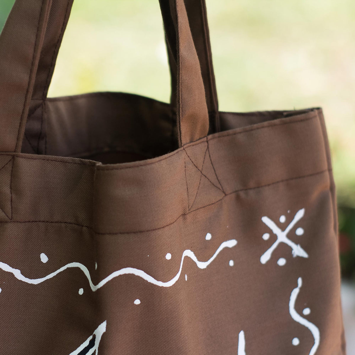 Blowing Bubbles In Brown Cotton Tote Bag