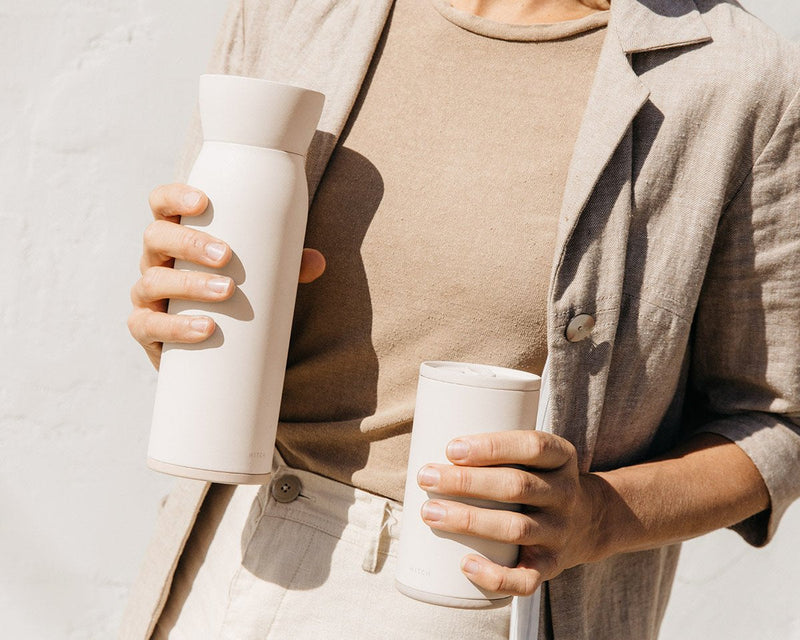 Drink on-the-go with this water bottle and cup all-in-one